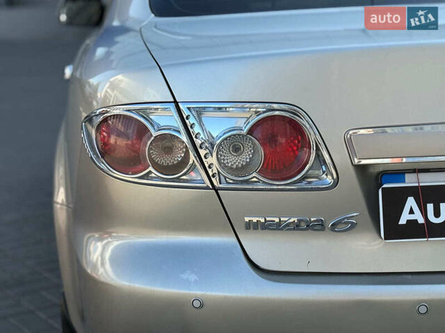 Бежевий Мазда 6, об'ємом двигуна 2 л та пробігом 296 тис. км за 5290 $, фото 4 на Automoto.ua