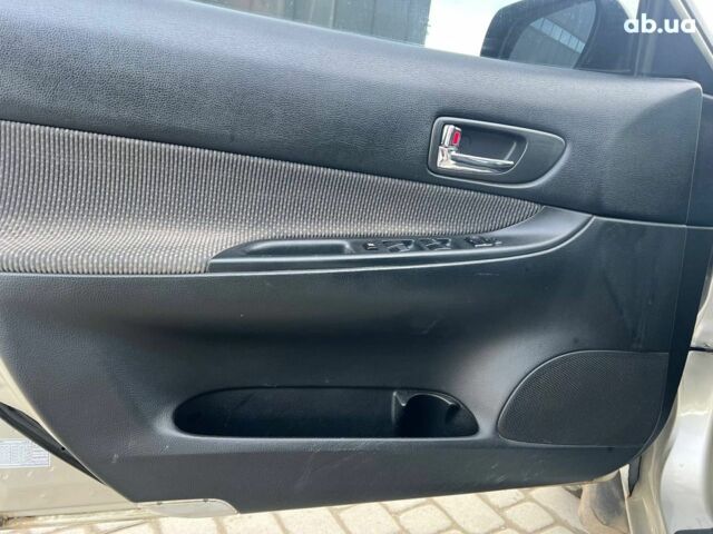 Бежевый Мазда 6, объемом двигателя 2 л и пробегом 187 тыс. км за 4190 $, фото 14 на Automoto.ua