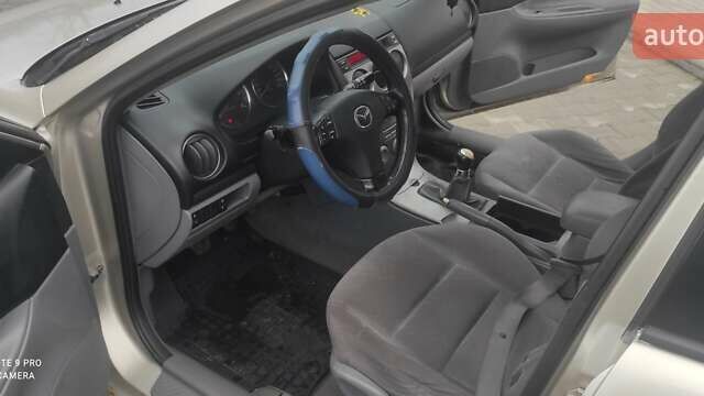 Бежевий Мазда 6, об'ємом двигуна 2 л та пробігом 350 тис. км за 1900 $, фото 9 на Automoto.ua