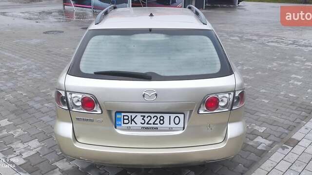 Бежевий Мазда 6, об'ємом двигуна 2 л та пробігом 350 тис. км за 1900 $, фото 5 на Automoto.ua