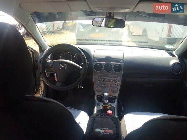 Бежевый Мазда 6, объемом двигателя 2 л и пробегом 208 тыс. км за 5100 $, фото 12 на Automoto.ua