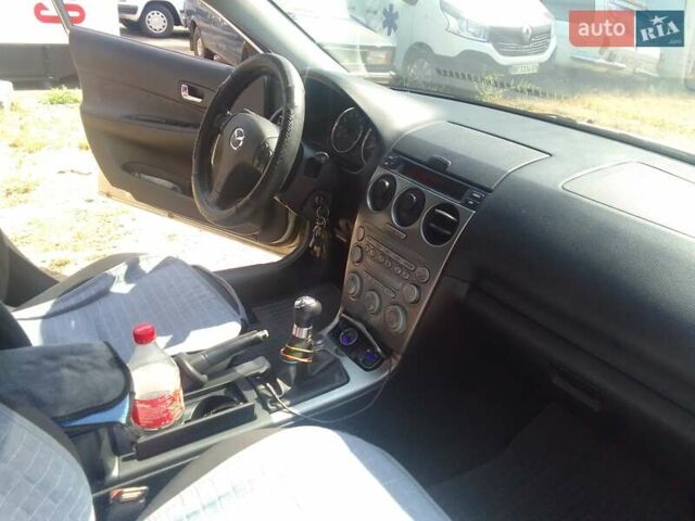 Бежевый Мазда 6, объемом двигателя 2 л и пробегом 208 тыс. км за 5100 $, фото 10 на Automoto.ua