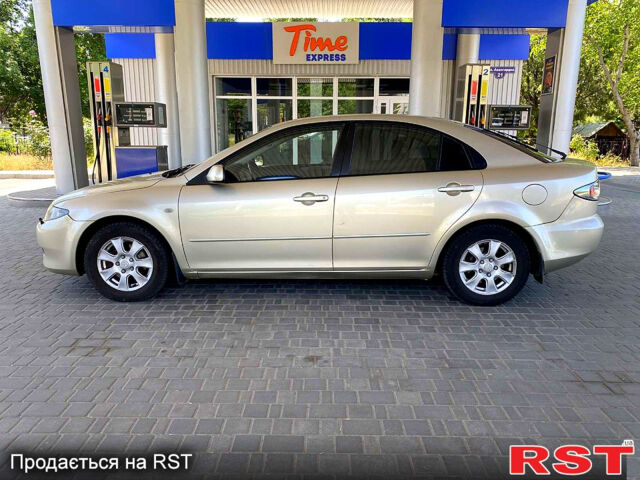 Бежевий Мазда 6, об'ємом двигуна 2 л та пробігом 189 тис. км за 4400 $, фото 7 на Automoto.ua