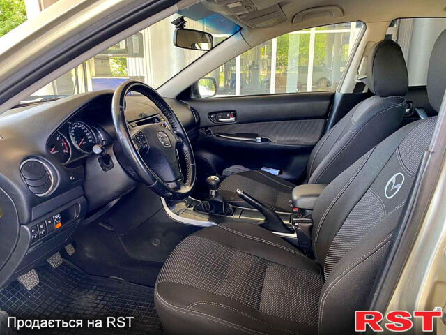 Бежевий Мазда 6, об'ємом двигуна 2 л та пробігом 189 тис. км за 4400 $, фото 9 на Automoto.ua