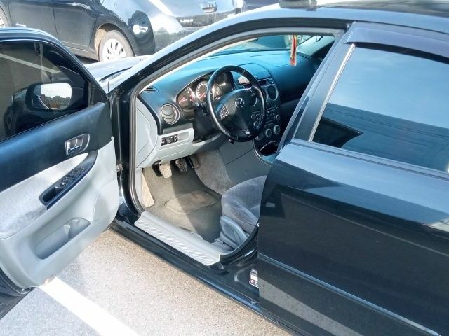 Черный Мазда 6, объемом двигателя 1.8 л и пробегом 210 тыс. км за 4998 $, фото 4 на Automoto.ua