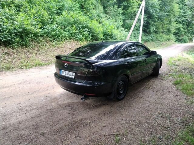 Черный Мазда 6, объемом двигателя 2 л и пробегом 300 тыс. км за 3021 $, фото 2 на Automoto.ua