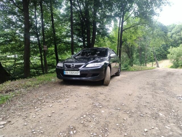 Черный Мазда 6, объемом двигателя 2 л и пробегом 300 тыс. км за 3021 $, фото 8 на Automoto.ua