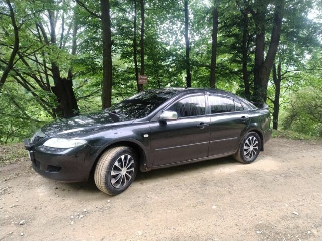 Черный Мазда 6, объемом двигателя 2 л и пробегом 300 тыс. км за 3021 $, фото 6 на Automoto.ua