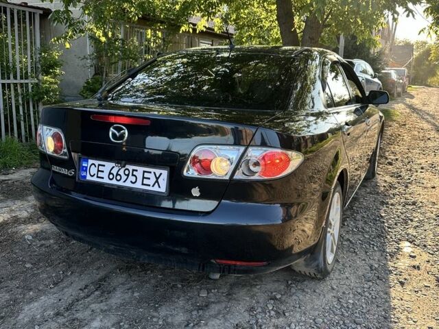Черный Мазда 6, объемом двигателя 2 л и пробегом 200 тыс. км за 3800 $, фото 12 на Automoto.ua