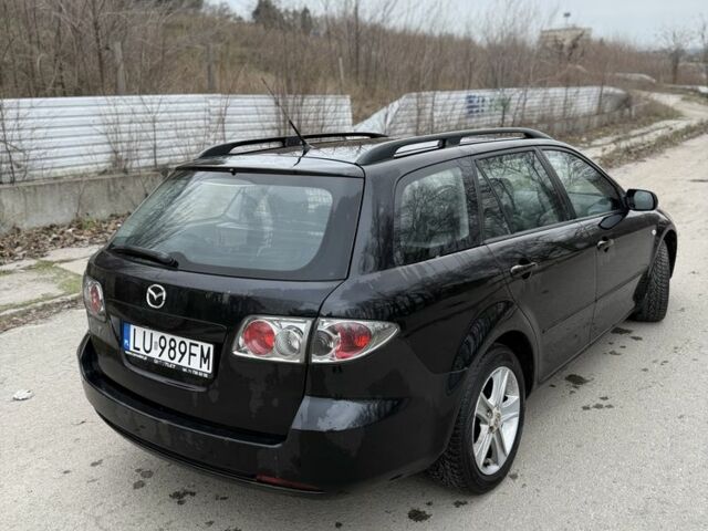 Чорний Мазда 6, об'ємом двигуна 2 л та пробігом 390 тис. км за 2600 $, фото 9 на Automoto.ua
