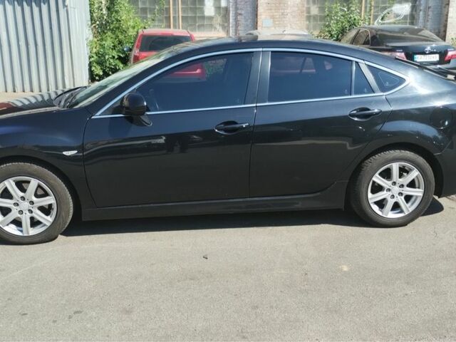 Черный Мазда 6, объемом двигателя 2.2 л и пробегом 300 тыс. км за 7500 $, фото 1 на Automoto.ua