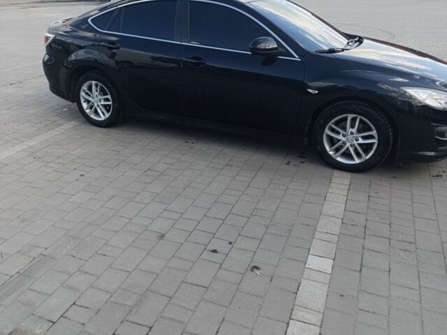 Черный Мазда 6, объемом двигателя 2.1 л и пробегом 288 тыс. км за 7700 $, фото 1 на Automoto.ua