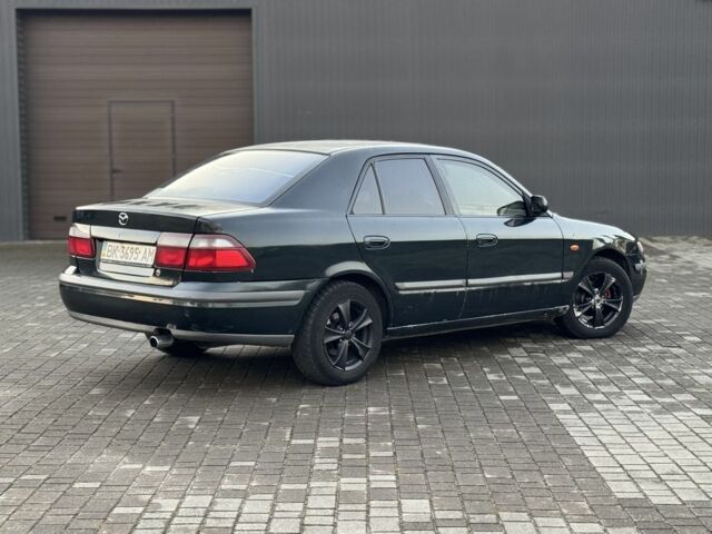 Черный Мазда 6, объемом двигателя 2 л и пробегом 300 тыс. км за 1800 $, фото 5 на Automoto.ua