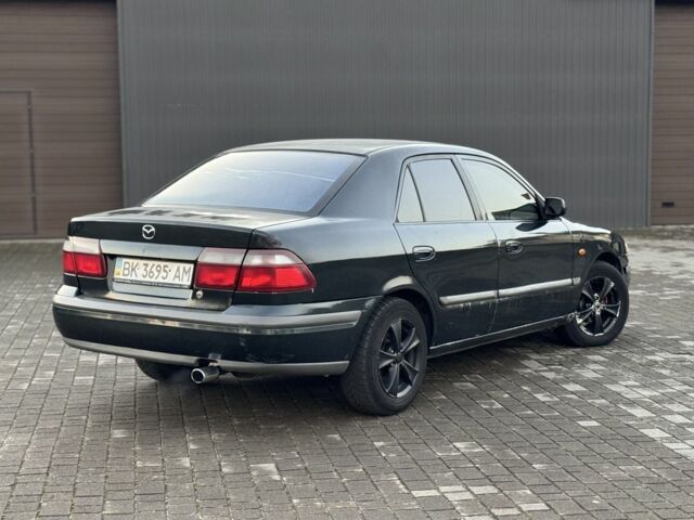 Черный Мазда 6, объемом двигателя 2 л и пробегом 300 тыс. км за 1800 $, фото 4 на Automoto.ua