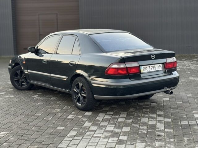 Черный Мазда 6, объемом двигателя 2 л и пробегом 300 тыс. км за 1800 $, фото 6 на Automoto.ua