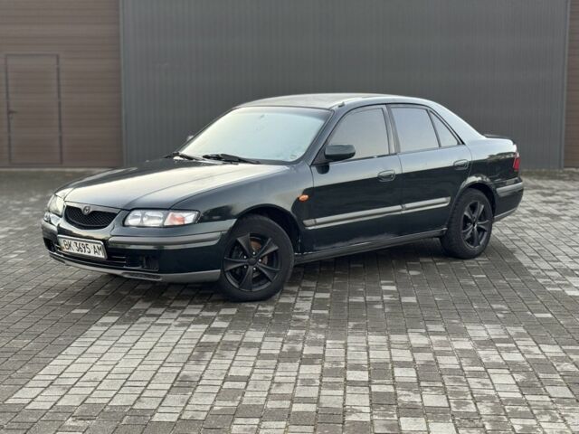 Черный Мазда 6, объемом двигателя 2 л и пробегом 300 тыс. км за 1800 $, фото 1 на Automoto.ua