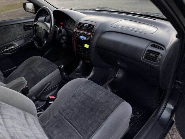 Черный Мазда 6, объемом двигателя 2 л и пробегом 300 тыс. км за 1800 $, фото 12 на Automoto.ua