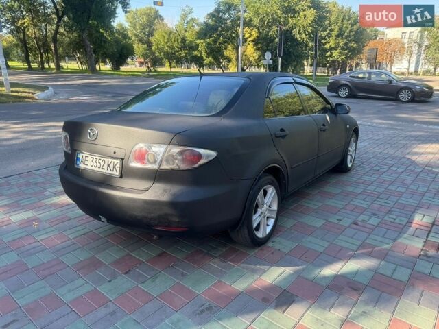 Черный Мазда 6, объемом двигателя 1.8 л и пробегом 365 тыс. км за 2250 $, фото 4 на Automoto.ua