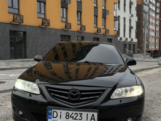 Черный Мазда 6, объемом двигателя 2.3 л и пробегом 303 тыс. км за 3800 $, фото 1 на Automoto.ua