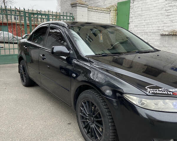 Черный Мазда 6, объемом двигателя 2.3 л и пробегом 173 тыс. км за 4600 $, фото 10 на Automoto.ua