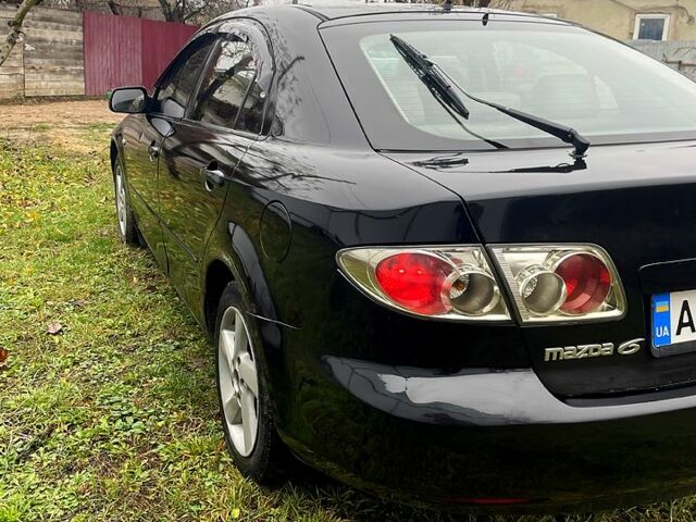 Черный Мазда 6, объемом двигателя 2 л и пробегом 340 тыс. км за 2999 $, фото 2 на Automoto.ua