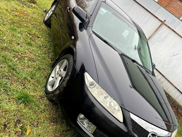 Черный Мазда 6, объемом двигателя 2 л и пробегом 340 тыс. км за 2999 $, фото 9 на Automoto.ua