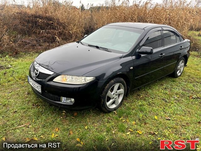 Черный Мазда 6, объемом двигателя 2 л и пробегом 340 тыс. км за 2999 $, фото 4 на Automoto.ua