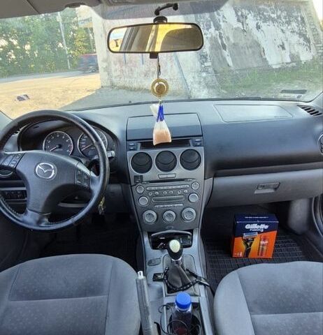 Черный Мазда 6, объемом двигателя 2 л и пробегом 10 тыс. км за 3300 $, фото 4 на Automoto.ua