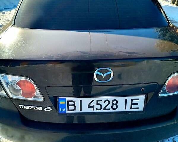 Черный Мазда 6, объемом двигателя 1.8 л и пробегом 210 тыс. км за 4600 $, фото 3 на Automoto.ua