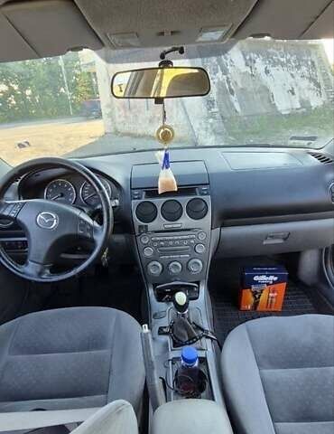 Черный Мазда 6, объемом двигателя 2 л и пробегом 10 тыс. км за 3300 $, фото 2 на Automoto.ua