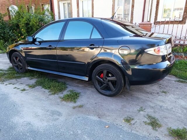 Черный Мазда 6, объемом двигателя 2 л и пробегом 350 тыс. км за 2999 $, фото 4 на Automoto.ua