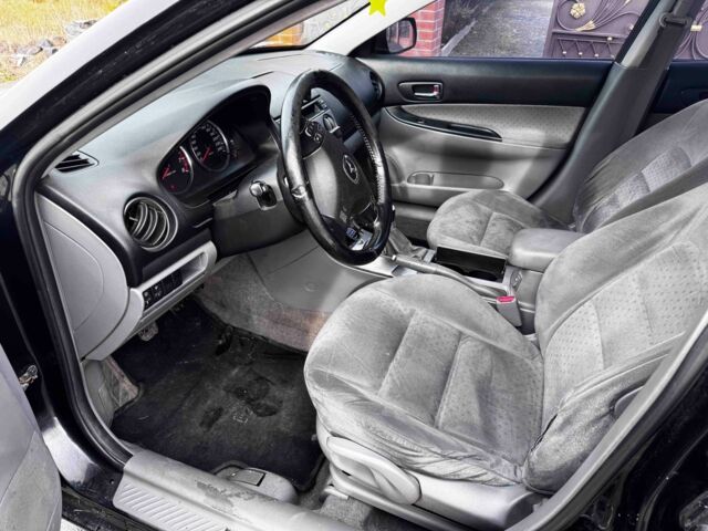 Черный Мазда 6, объемом двигателя 1.8 л и пробегом 250 тыс. км за 2000 $, фото 4 на Automoto.ua