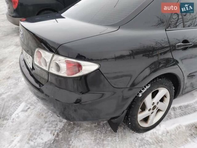 Черный Мазда 6, объемом двигателя 2 л и пробегом 350 тыс. км за 2400 $, фото 8 на Automoto.ua