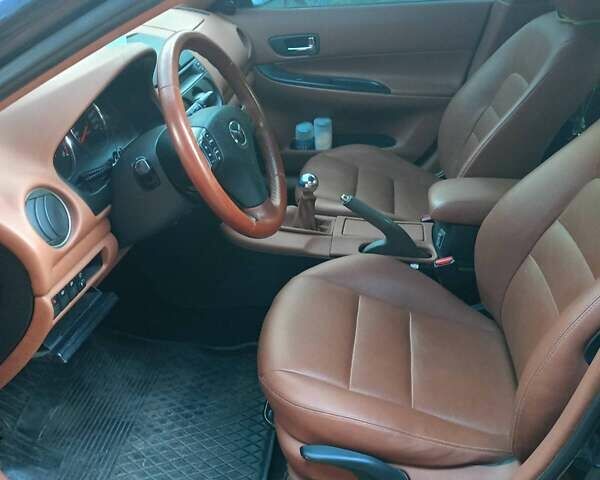 Черный Мазда 6, объемом двигателя 2 л и пробегом 245 тыс. км за 4999 $, фото 3 на Automoto.ua