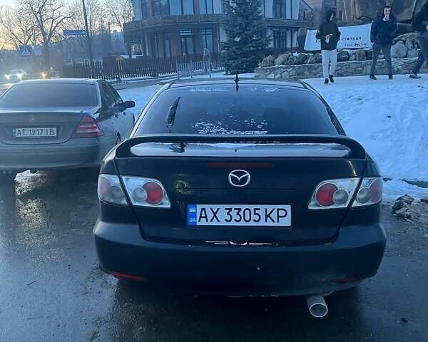 Черный Мазда 6, объемом двигателя 2 л и пробегом 321 тыс. км за 2100 $, фото 4 на Automoto.ua