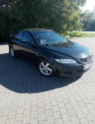 Черный Мазда 6, объемом двигателя 2 л и пробегом 374 тыс. км за 4199 $, фото 1 на Automoto.ua