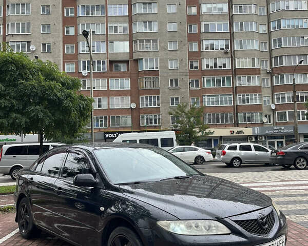 Черный Мазда 6, объемом двигателя 2 л и пробегом 390 тыс. км за 2699 $, фото 3 на Automoto.ua