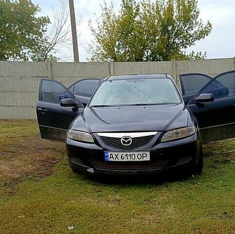 Черный Мазда 6, объемом двигателя 1.8 л и пробегом 283 тыс. км за 4500 $, фото 5 на Automoto.ua