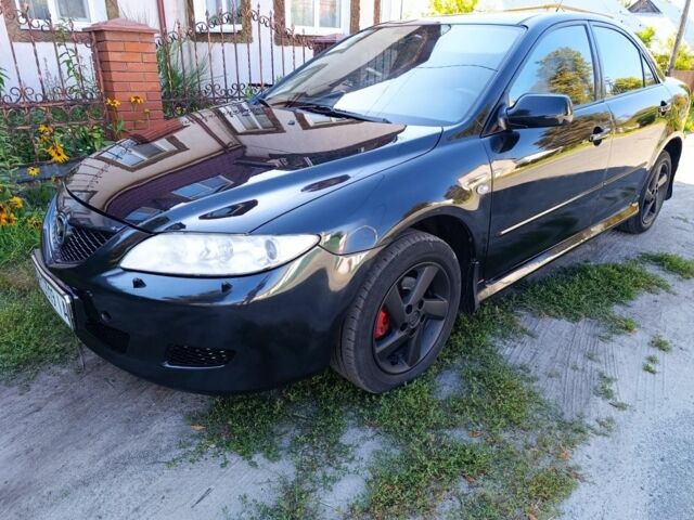 Черный Мазда 6, объемом двигателя 2 л и пробегом 350 тыс. км за 2999 $, фото 3 на Automoto.ua