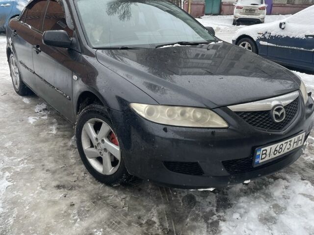 Черный Мазда 6, объемом двигателя 2 л и пробегом 240 тыс. км за 4000 $, фото 1 на Automoto.ua