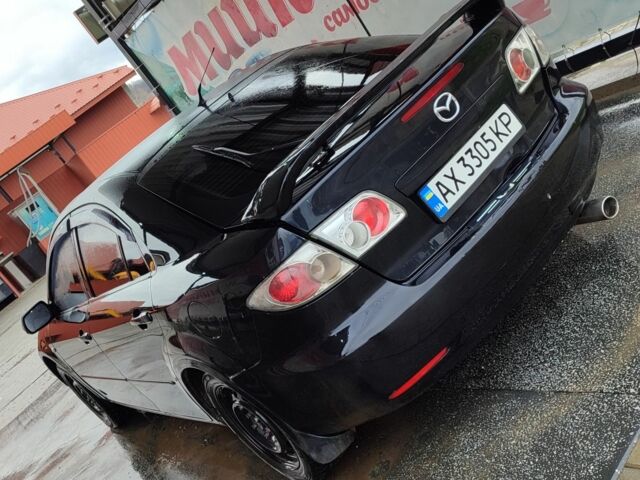 Черный Мазда 6, объемом двигателя 2 л и пробегом 317 тыс. км за 3000 $, фото 4 на Automoto.ua