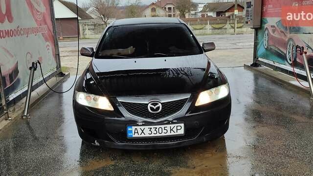Черный Мазда 6, объемом двигателя 2 л и пробегом 317 тыс. км за 3000 $, фото 4 на Automoto.ua
