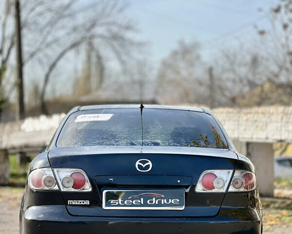 Чорний Мазда 6, об'ємом двигуна 2 л та пробігом 242 тис. км за 3499 $, фото 4 на Automoto.ua