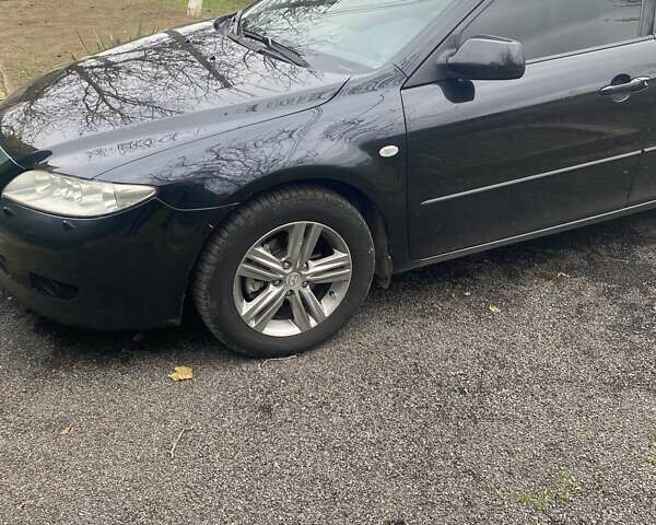 Черный Мазда 6, объемом двигателя 2 л и пробегом 416 тыс. км за 4800 $, фото 2 на Automoto.ua