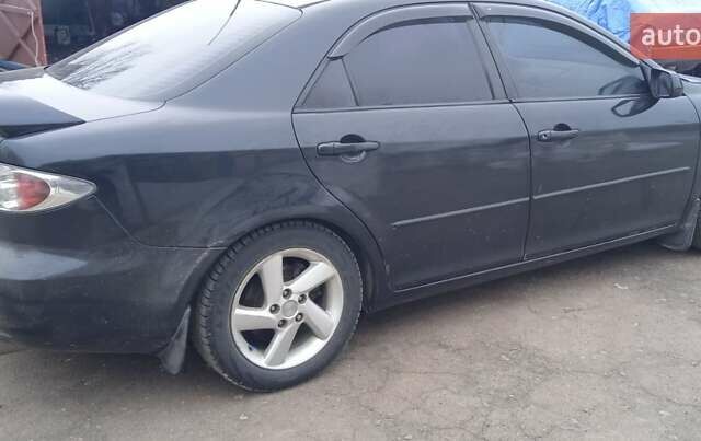 Черный Мазда 6, объемом двигателя 2 л и пробегом 249 тыс. км за 4555 $, фото 2 на Automoto.ua