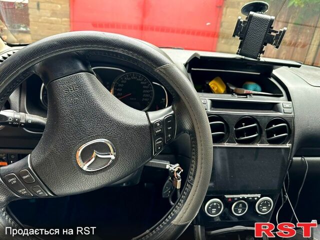 Черный Мазда 6, объемом двигателя 2 л и пробегом 270 тыс. км за 3300 $, фото 7 на Automoto.ua