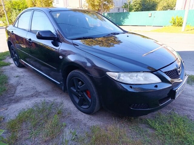 Черный Мазда 6, объемом двигателя 2 л и пробегом 350 тыс. км за 2999 $, фото 2 на Automoto.ua