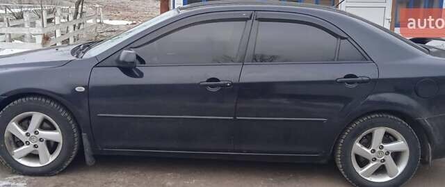 Черный Мазда 6, объемом двигателя 2 л и пробегом 249 тыс. км за 4555 $, фото 3 на Automoto.ua