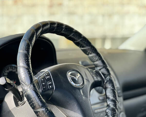 Чорний Мазда 6, об'ємом двигуна 2 л та пробігом 242 тис. км за 3499 $, фото 8 на Automoto.ua