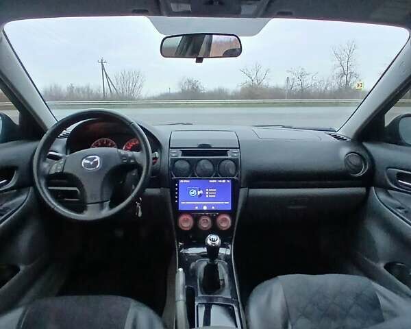 Чорний Мазда 6, об'ємом двигуна 1.8 л та пробігом 339 тис. км за 3600 $, фото 7 на Automoto.ua